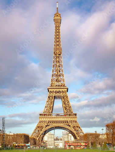 Fototapeta Naklejka Na Ścianę i Meble -  Romantic Eiffel Tower on a blue cloudy Paris France Morning	
