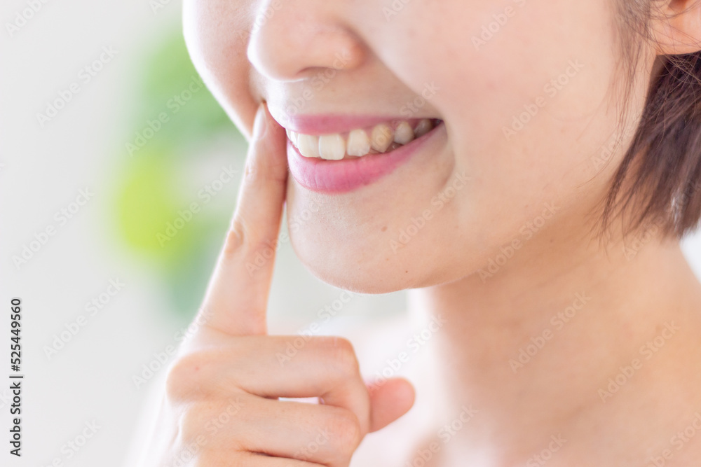 Obraz premium 笑顔の女性(美容・歯・ホワイトニング)