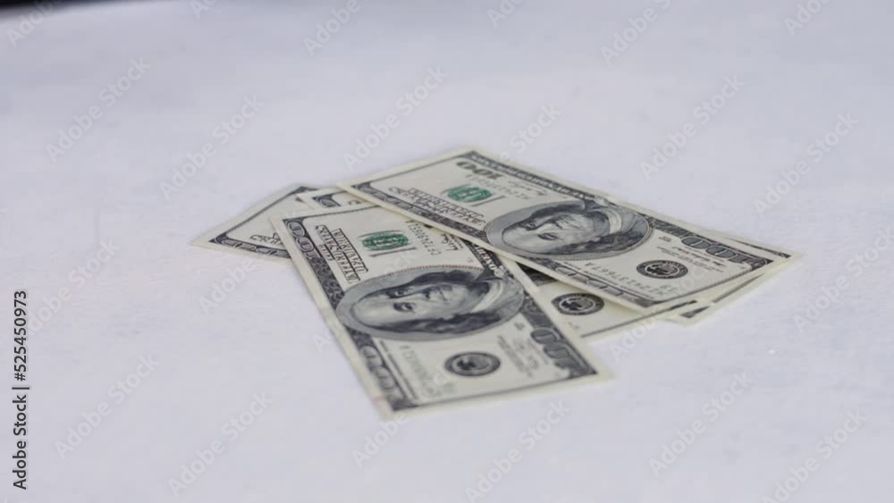 Counting Old 100 US Dollar Banknotes On The Table. close up Counting Old 100 US Dollar Banknotes On The Table. close up