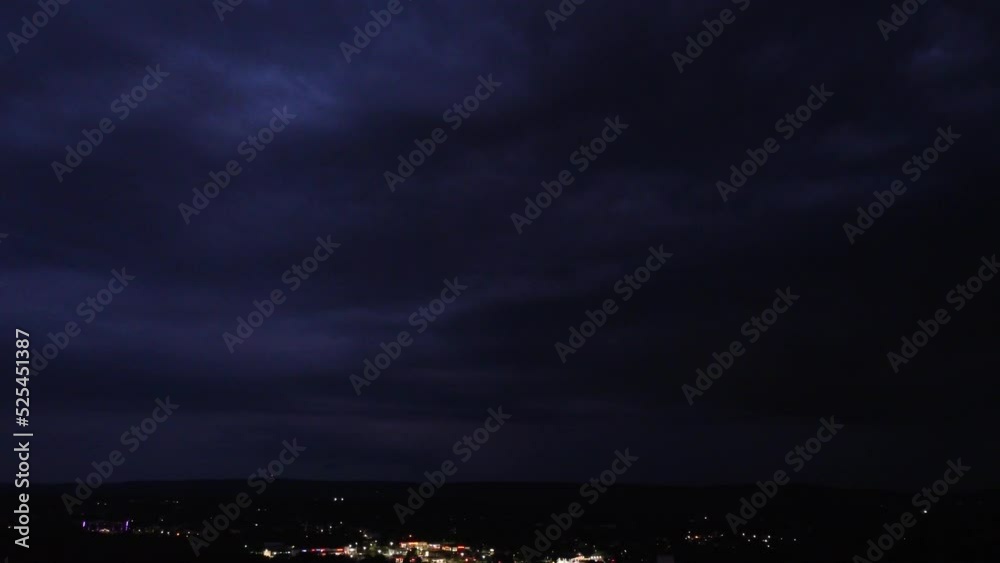 Thunder and lightning in a storm cloud-filled night sky Thunder and lightning in a storm cloud-filled night sky