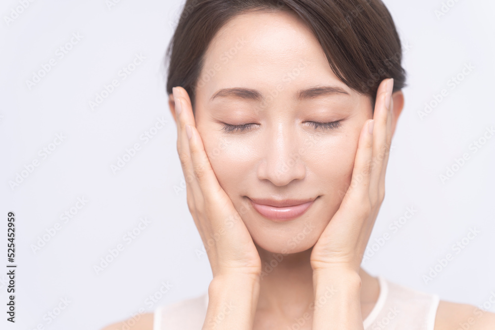 Skin care. Woman with beauty face touching healthy facial skin portrait. Asian woman. Skin care. Woman with beauty face touching healthy facial skin portrait. Asian woman.