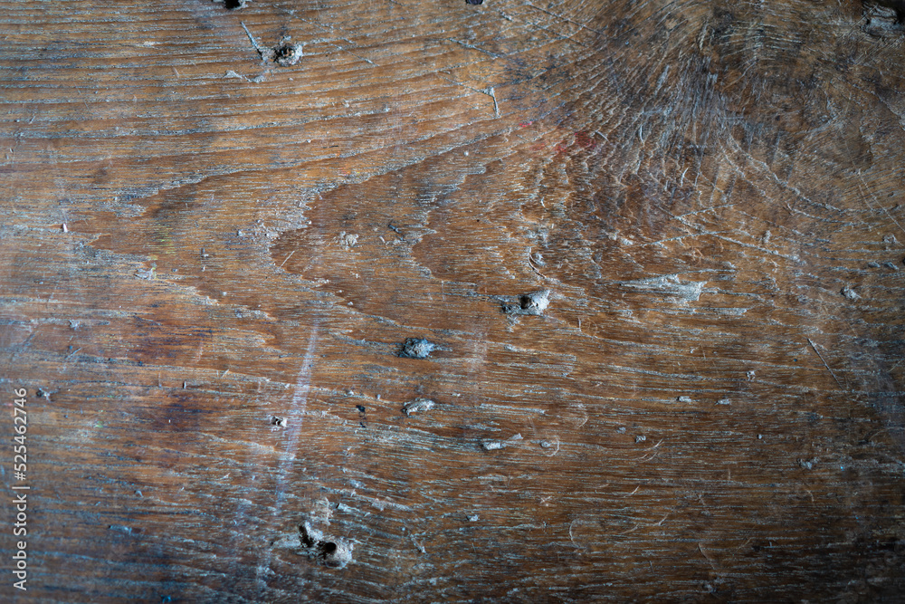Naklejka premium Old used natural surface textured plank brown wooden background.