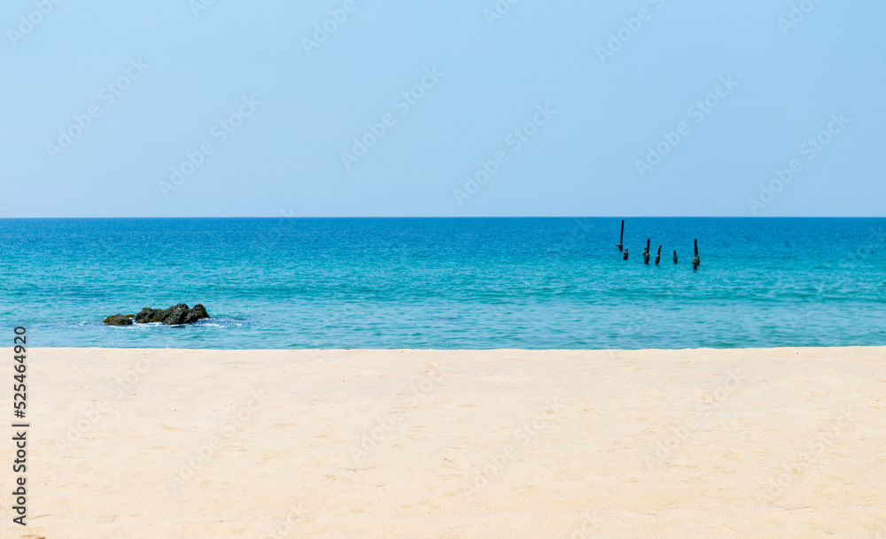 Fototapeta premium Peaceful tropical beach in south of Thailand, clean fine sandy beach in summer, empty beach