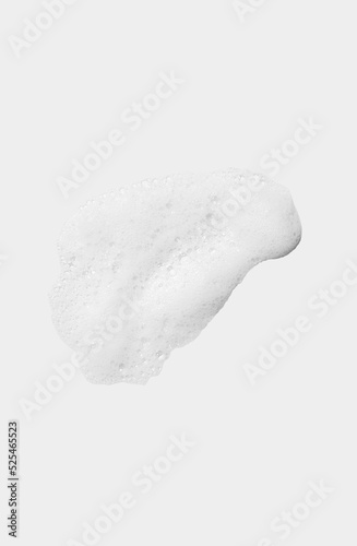 Skincare cleanser foam texture of different shapes. Thick and light. Dense and sparse. Face wash foam Soap shower gel shampoo foam texture. bubbles and foam on white grey background closeup  top view