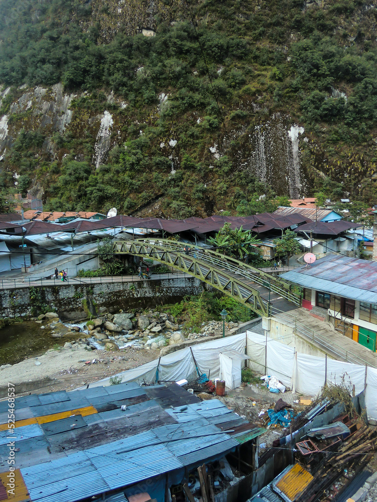 A town in the Andes, prefabricated houses with metal roofs