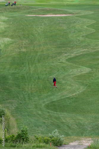 golfers on a golf course