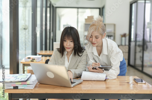 Business strategy investment concept Two asian businesswoman confident and discussing at office 