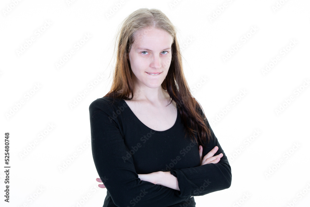 young woman with arms crossed folded hands in white background young woman with arms crossed folded hands in white background