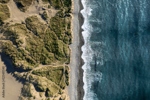 Wallpaper Mural Aerial view on sand dunes by the ocean. Strandhill beach in county Sligo, Ireland. Warm sunny day. Irish nature scene. Torontodigital.ca