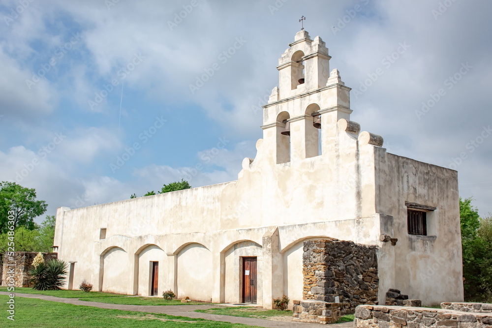 Historic Spanish architecture building San Antonio Texas Mission San Juan on a cloudy day	
