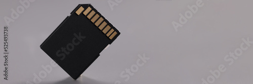 Black sd memory card, compact card with gold colored connectors