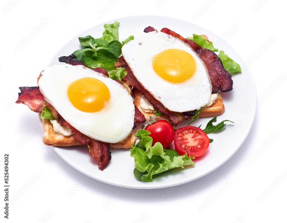 French toasts with fried eggs, cream cheese, salad and bacon French toasts with fried eggs, cream cheese, salad and bacon