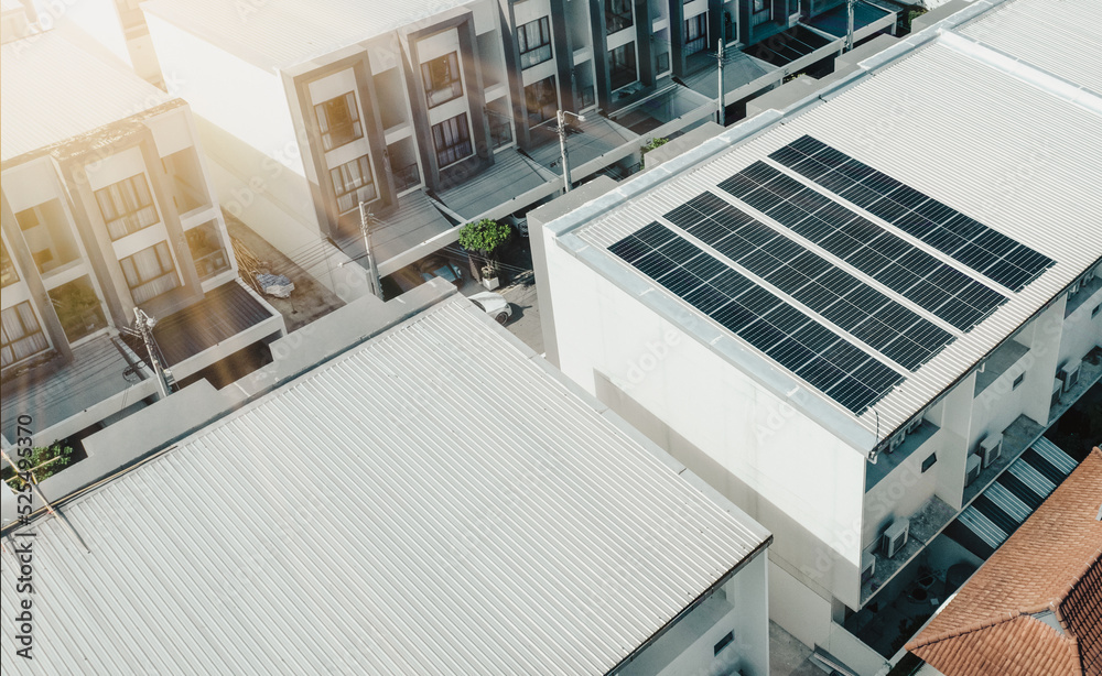 Fototapeta premium solar cell panels on rooftop of house, Save energy concept