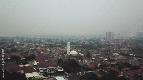 Aerial drone view of Jakarta City and looks like a mosque