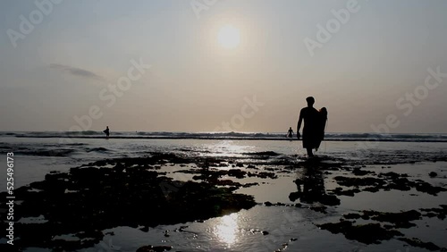 couple on the beach at sunset