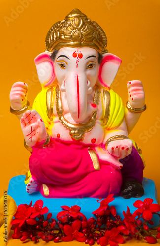 Hindu God Ganesha. Ganesha Idol on beautiful background. © Raksha