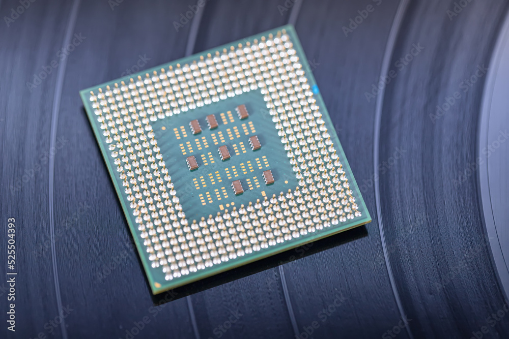 A giant leap in technology between recording on vinyl records and the creation of computer processor A giant leap in technology between recording on vinyl records and the creation of computer processor