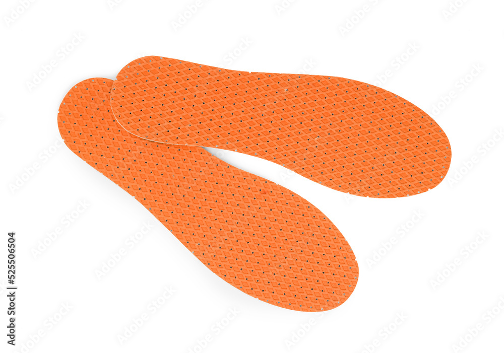 Pair of orange orthopedic insoles on white background, top view Pair of orange orthopedic insoles on white background, top view