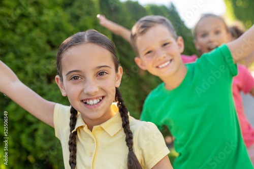 Girls and boys having fun outdoors © zinkevych