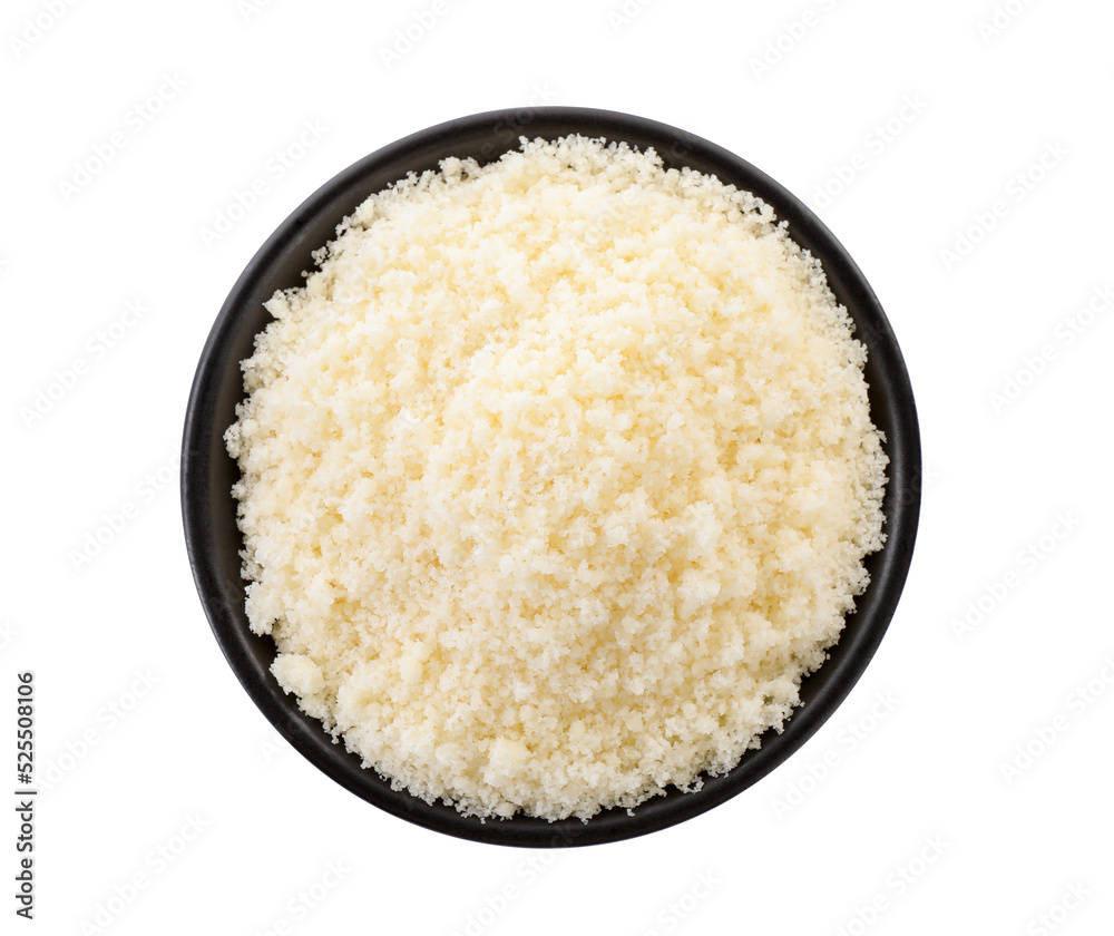 Bowl with grated parmesan cheese isolated on white, top view Bowl with grated parmesan cheese isolated on white, top view