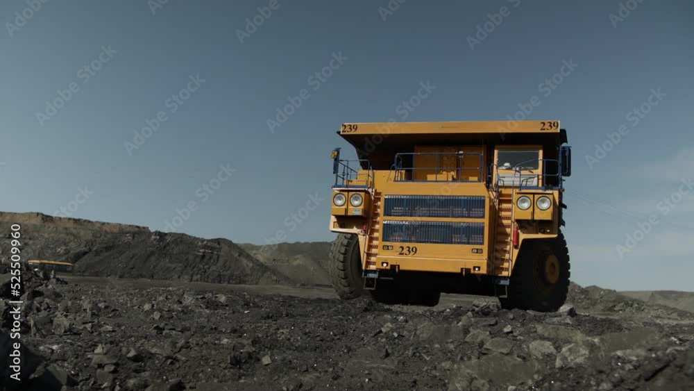 Open pit mine industry, big yellow mining truck for coal anthracite. Open pit mine industry, big yellow mining truck for coal anthracite.