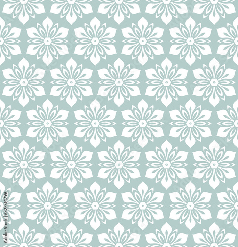 Floral light blue and white ornament. Seamless abstract classic background with flowers. Pattern with white repeating floral elements. Ornament for fabric  wallpaper and packaging