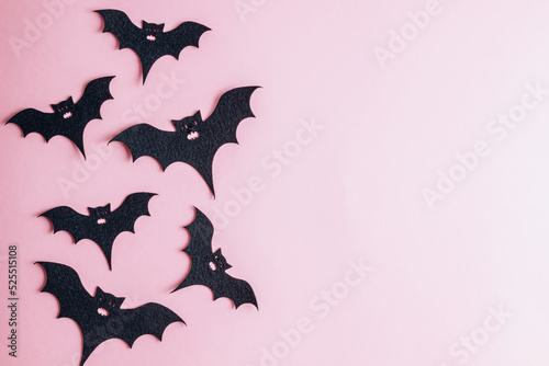 Halloween decorations on pastel pink background. Halloween concept. Flat lay, top view, copy space