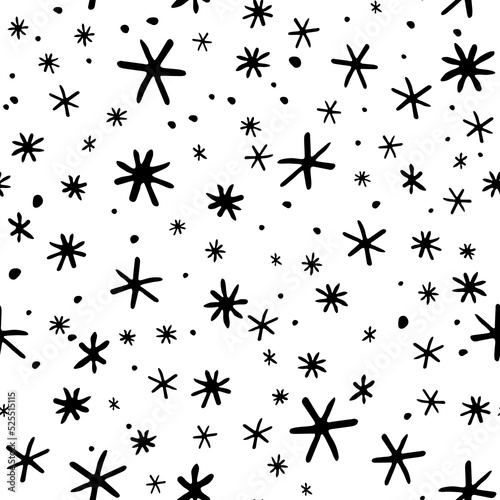 Vector seamless pattern from snowflakes in doodle style. Winter  christmas  new year background and texture. Snowfall  falling snow  blizzard