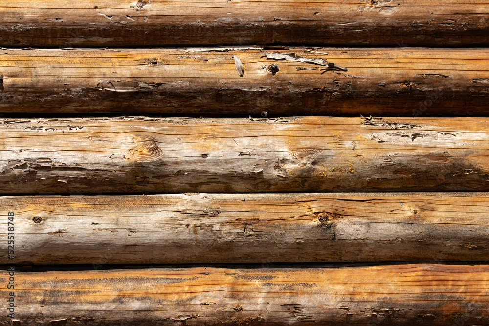 Naklejka premium background of wooden log cabins wood