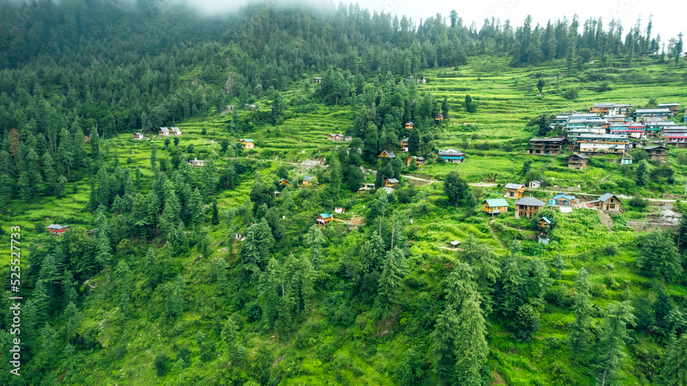 aerial landscape of rural village in the lush mountains of Himachal Pradesh India 