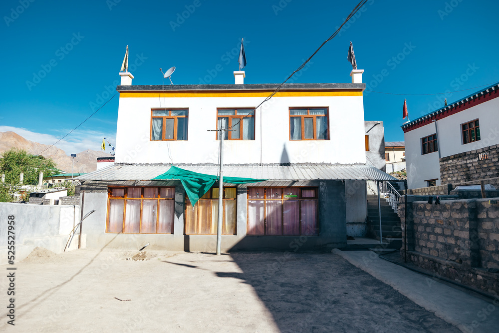 beautiful white Tibetan mud house on a sunny day in Kaza Spiti Valley of India
