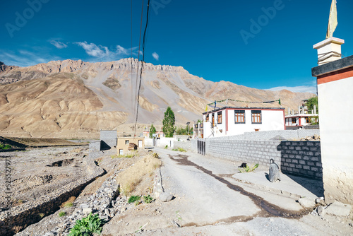 local mud homes in the dry desolate terrain of Kaza in Spiti Valley during summer