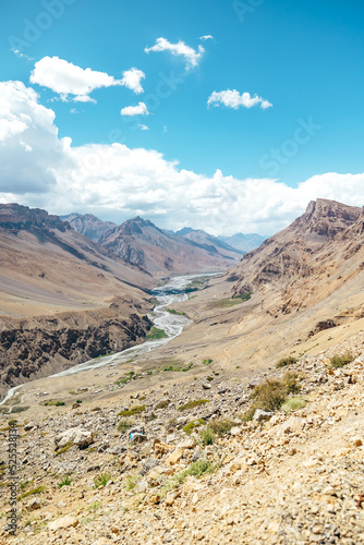 River flowing through Spiti Valley on sunny day near Kaza in Himachal Pradesh 