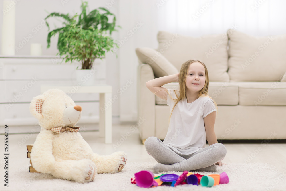 Photo of little girl posing for a photo with her toys. Photo of little girl posing for a photo with her toys.