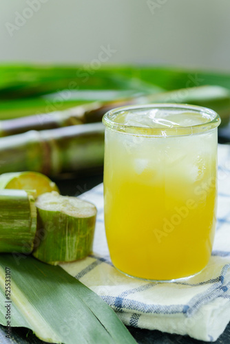 Fresh squeezed sugar cane juice, Sugar cane juice, Sugar cane drink with ice.