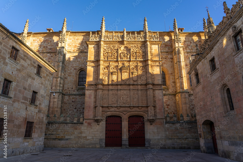 Historical University of Salamanca facade at sunset in the old town, Castilla y Leon, Spain.