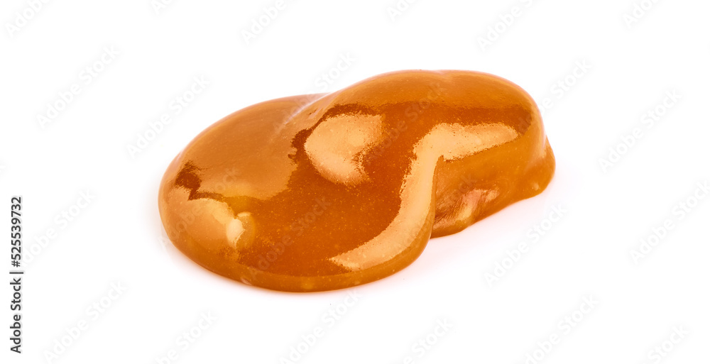 Caramel candies with caramel sauce, isolated on white background. Caramel candies with caramel sauce, isolated on white background.