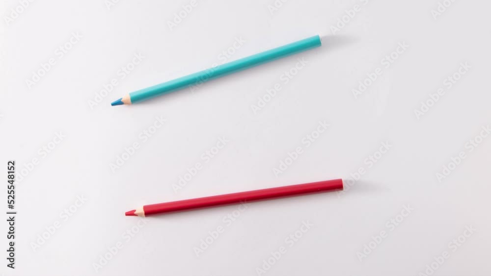Colored wooden pencils on gray background, minimal back to school concept, 4K video animation Colored wooden pencils on gray background, minimal back to school concept, 4K video animation
