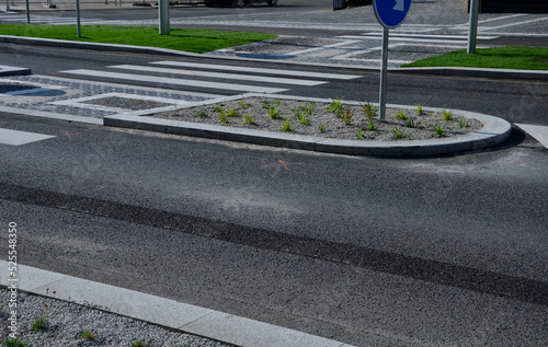 Fotografie pedestrian crossing with dividing island between lanes