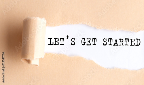 The text LET'S GET STARTED appears on torn paper on white background.