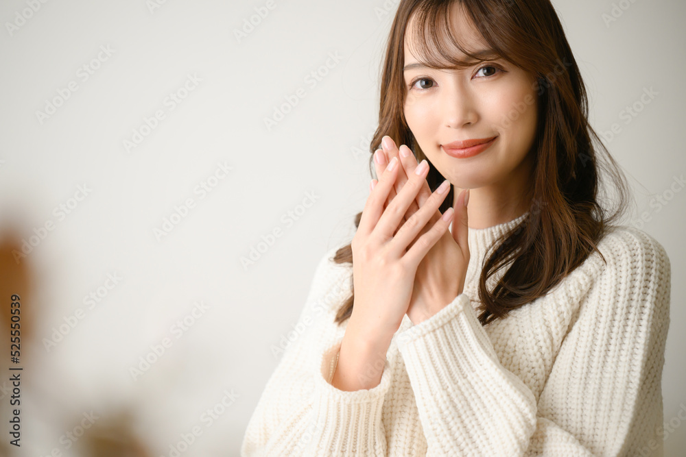 Beautiful woman concerned about rough hands. Beautiful woman concerned about rough hands.