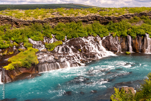 At 700 meters wide  the Hraunfossar waterfall apparently springs from a lava field  Iceland