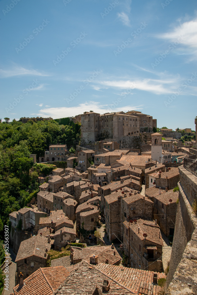 Tuscany, Italy. Panoramic view of the medieval hill town of Sorano. Etruscan towns of Tuscany. Towns that have existed for the second millennium. Ancient Sorano Tuscany, Italy. Panoramic view of the medieval hill town of Sorano. Etruscan towns of Tuscany. Towns that have existed for the second millennium. Ancient Sorano