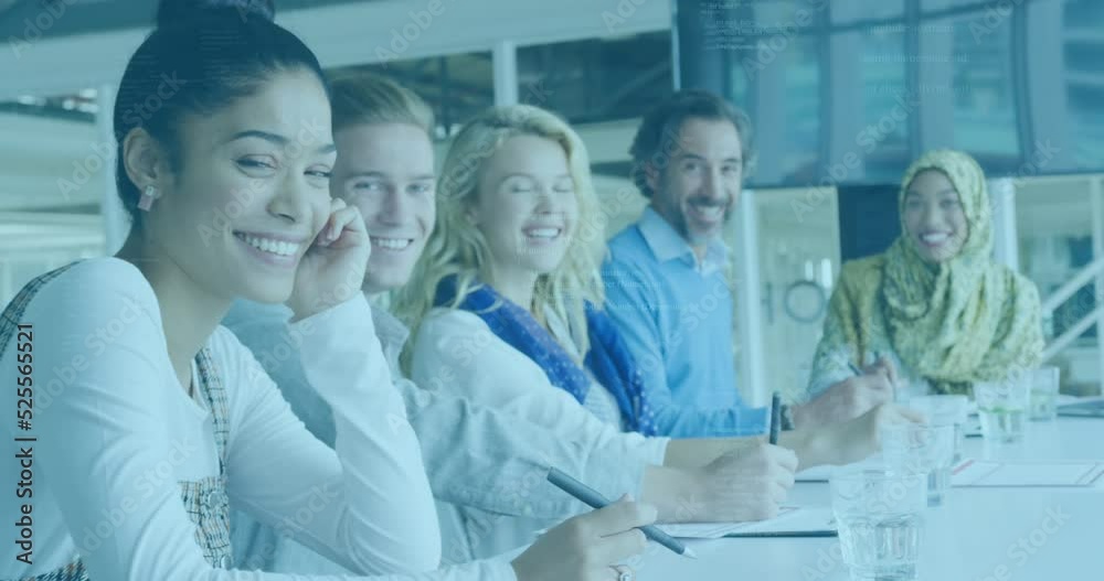 Animation of data processing over portrait of diverse male and female colleagues smiling at office Animation of data processing over portrait of diverse male and female colleagues smiling at office