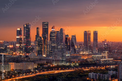Urban landscape from a height. Business center "Moscow City" at dawn. Illumination of skyscrapers at dusk. Sight. Business center.