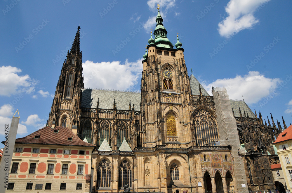 The main facade of St. Vitus Cathedral Street, Prague, Czech Republic, the decorative elements of the facade, cut stone with signs of restoration