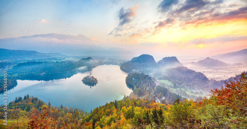 Amazing sunrise over popular tourist destination  Bled lake.
