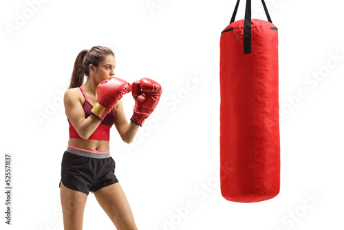 Φωτογραφία Strong young female training box with a punching bag