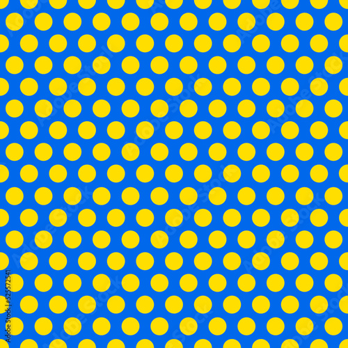 Polka dot texture, yellow on blue polka dot seamless pattern as background