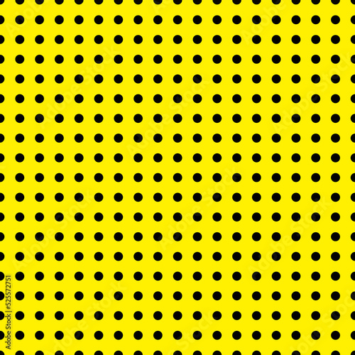 Polka dot texture, black on yellow polka dot seamless pattern as background
